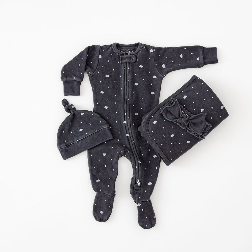 Child wearing Organic Cozy 2-Way Zipper Footie in Coal Clouds.