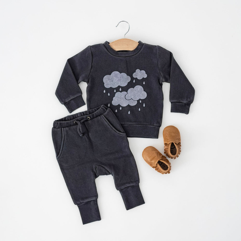 Child wearing Organic Cozy Graphic Sweatshirt & Jogger Set in Coal Clouds.