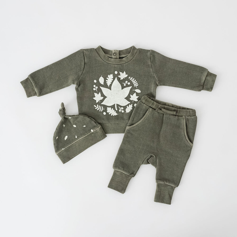 Child wearing Organic Cozy Graphic Sweatshirt & Jogger Set in Hunter Leaves.