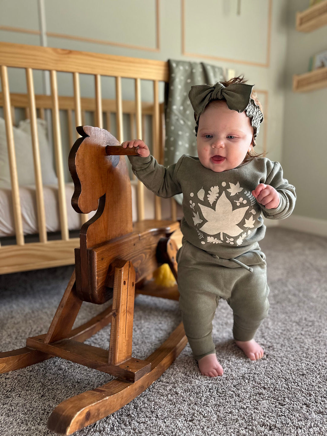 Child wearing Organic Cozy Graphic Sweatshirt & Jogger Set in Hunter Leaves.