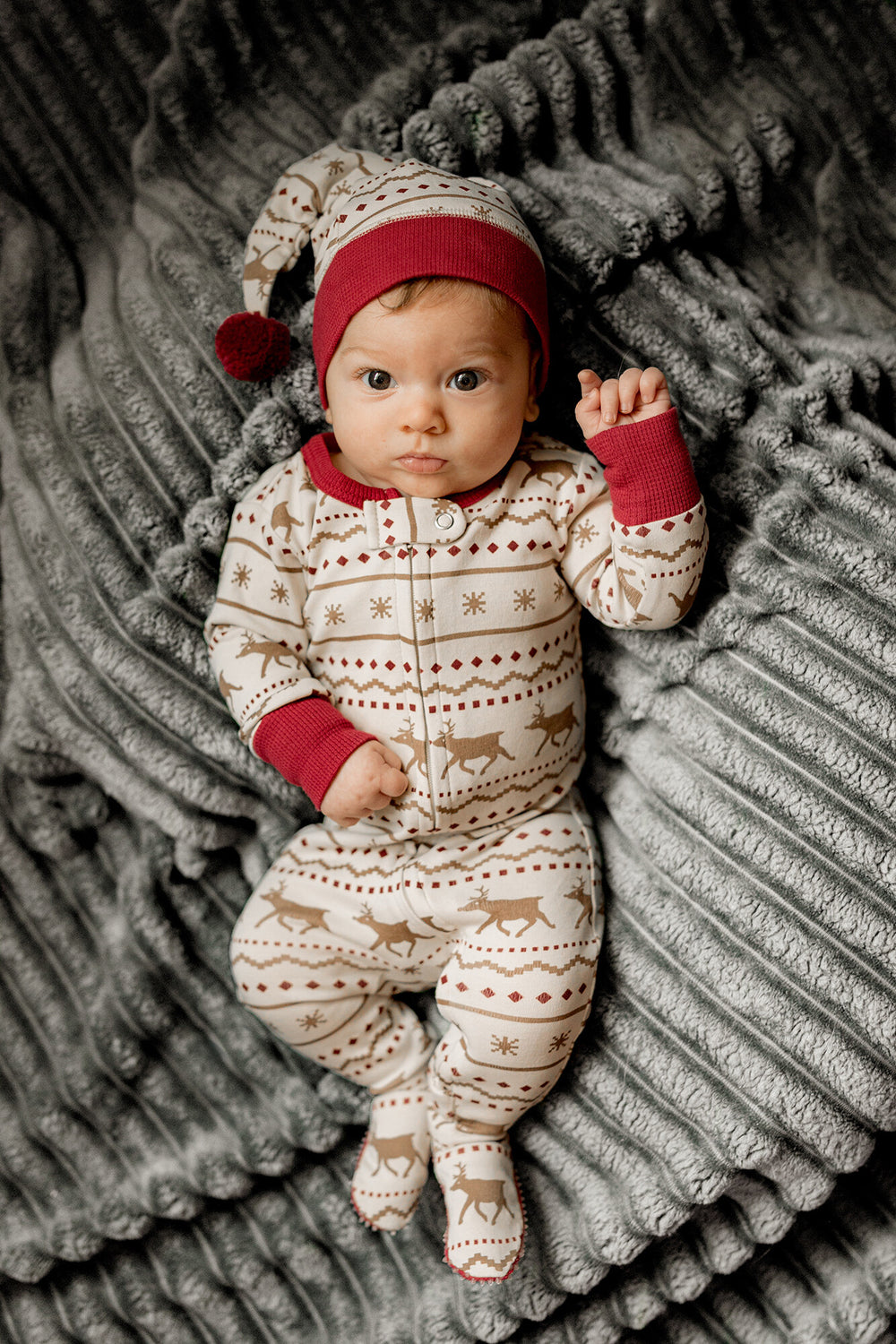 Child wearing Holiday 2-Way Zipper Footie & Cap Set in Fair Isle Rudolph.