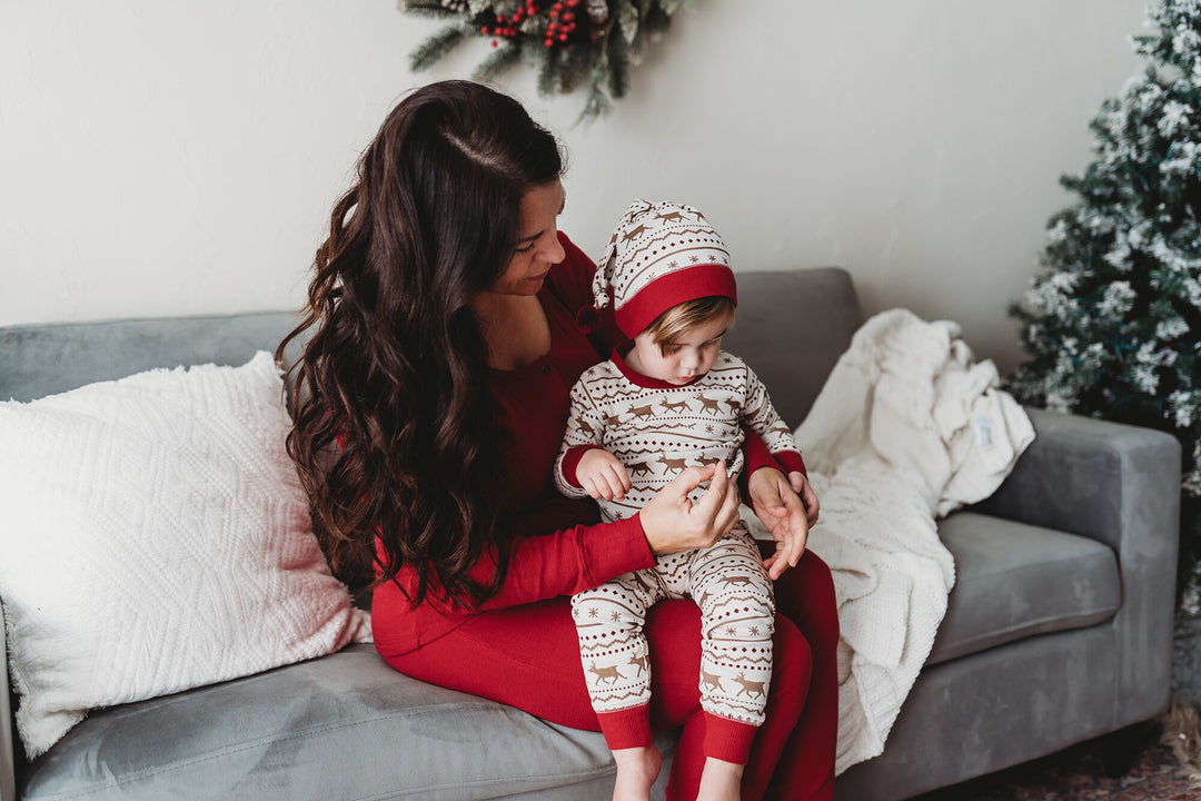 Child wearing Kids' Organic Holiday PJ & Cap Set in Fair Isle Rudolph.