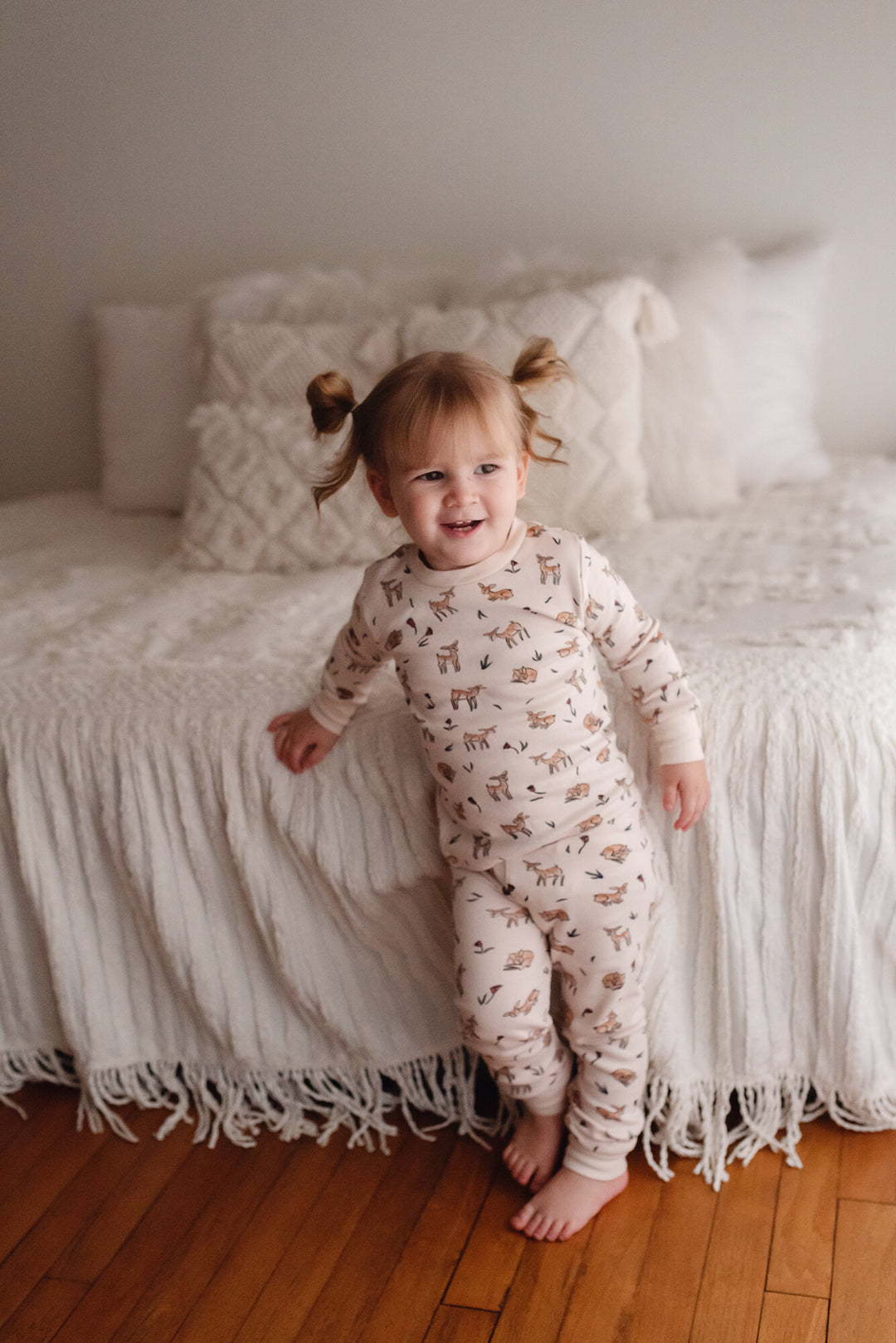 Child wearing Kids' Organic L/Sleeve PJ Set in Doe-a-Deer.