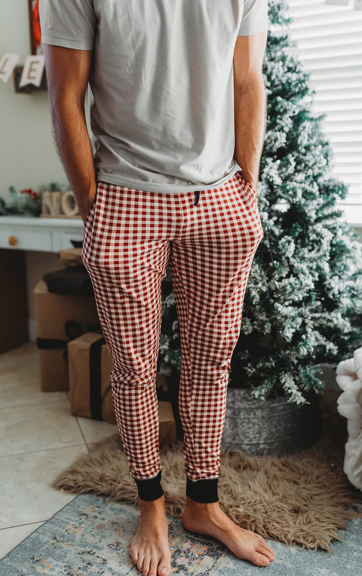 Child wearing Men's Organic Holiday Jogger & Cap Set in Crimson Plaid.