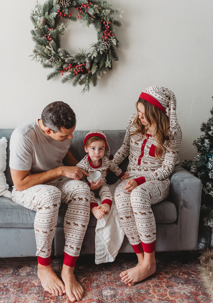 Child wearing Men's Organic Holiday Jogger & Cap Set in Fair Isle Rudolph.