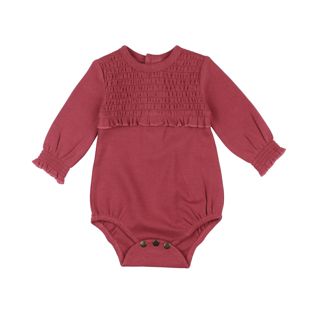 Organic Smocked Chest Bodysuit in Appleberry, a dark, dusky pink color.