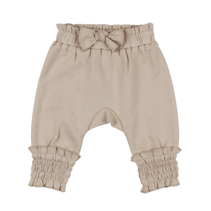 Organic Smocked Bubble Pants in Oatmeal, a light tan color.