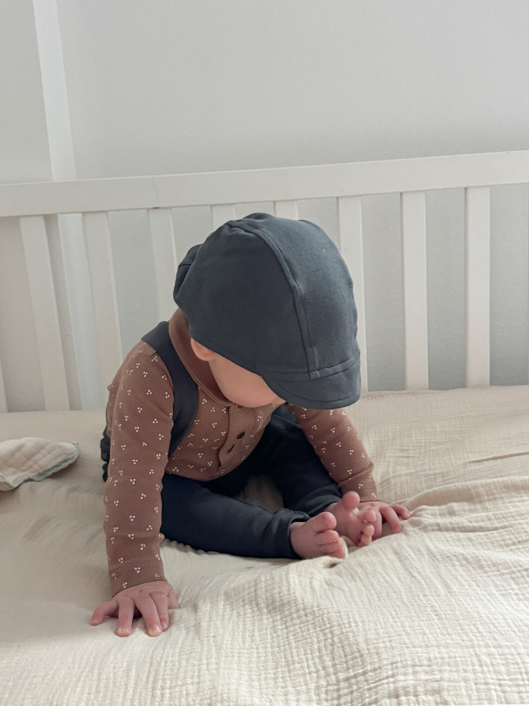 Child wearing Organic Riding Cap in Charcoal.