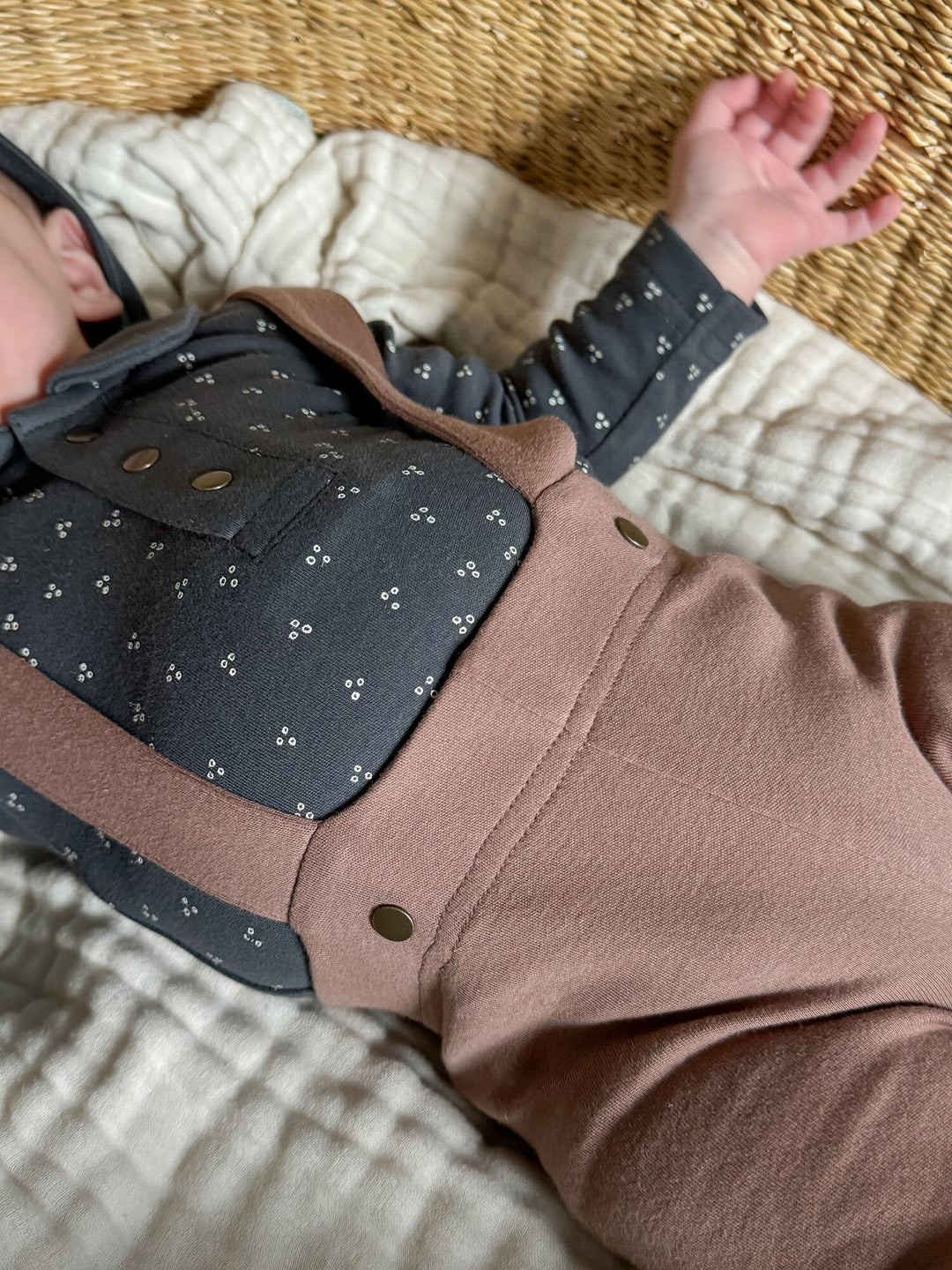 Child wearing Organic Suspender Pant in Latte.