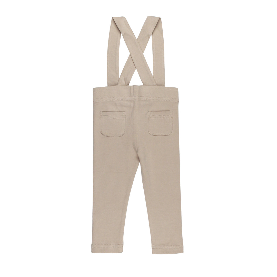 Back view of Organic Suspender Pant in Oatmeal, a light tan color.