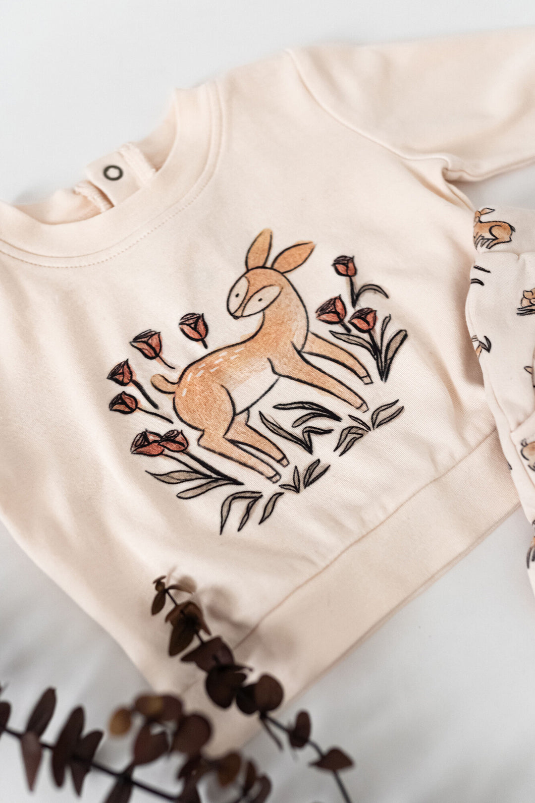 Child wearing Organic Sweatshirt & Jogger Set in Doe-a-Deer.