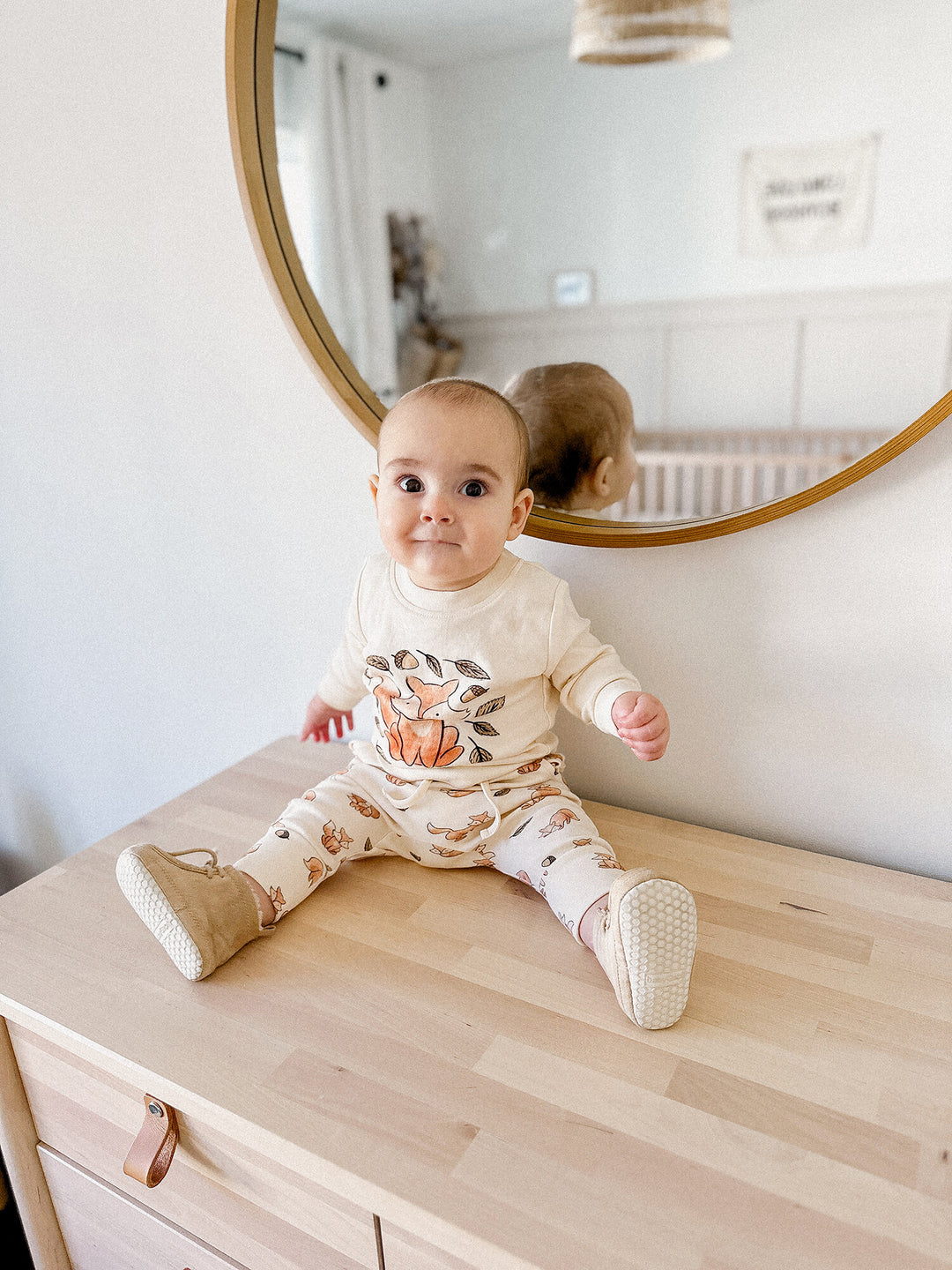 Child wearing Organic Sweatshirt & Jogger Set in Foxy.