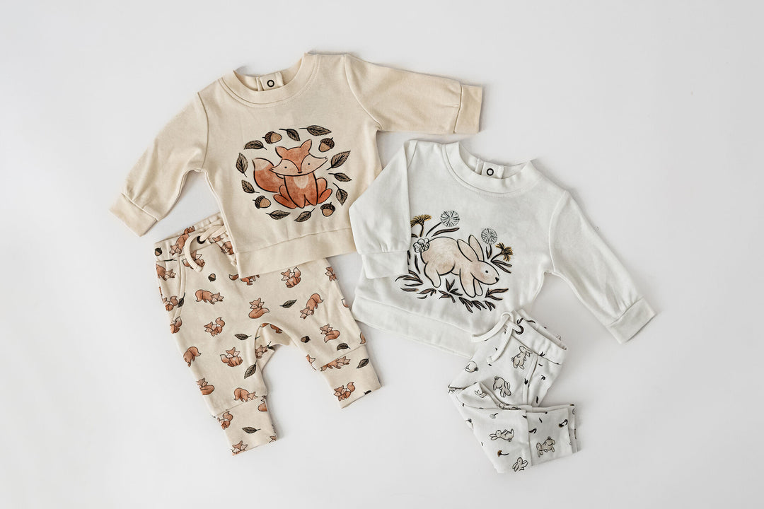 Child wearing Organic Sweatshirt & Jogger Set in Foxy.