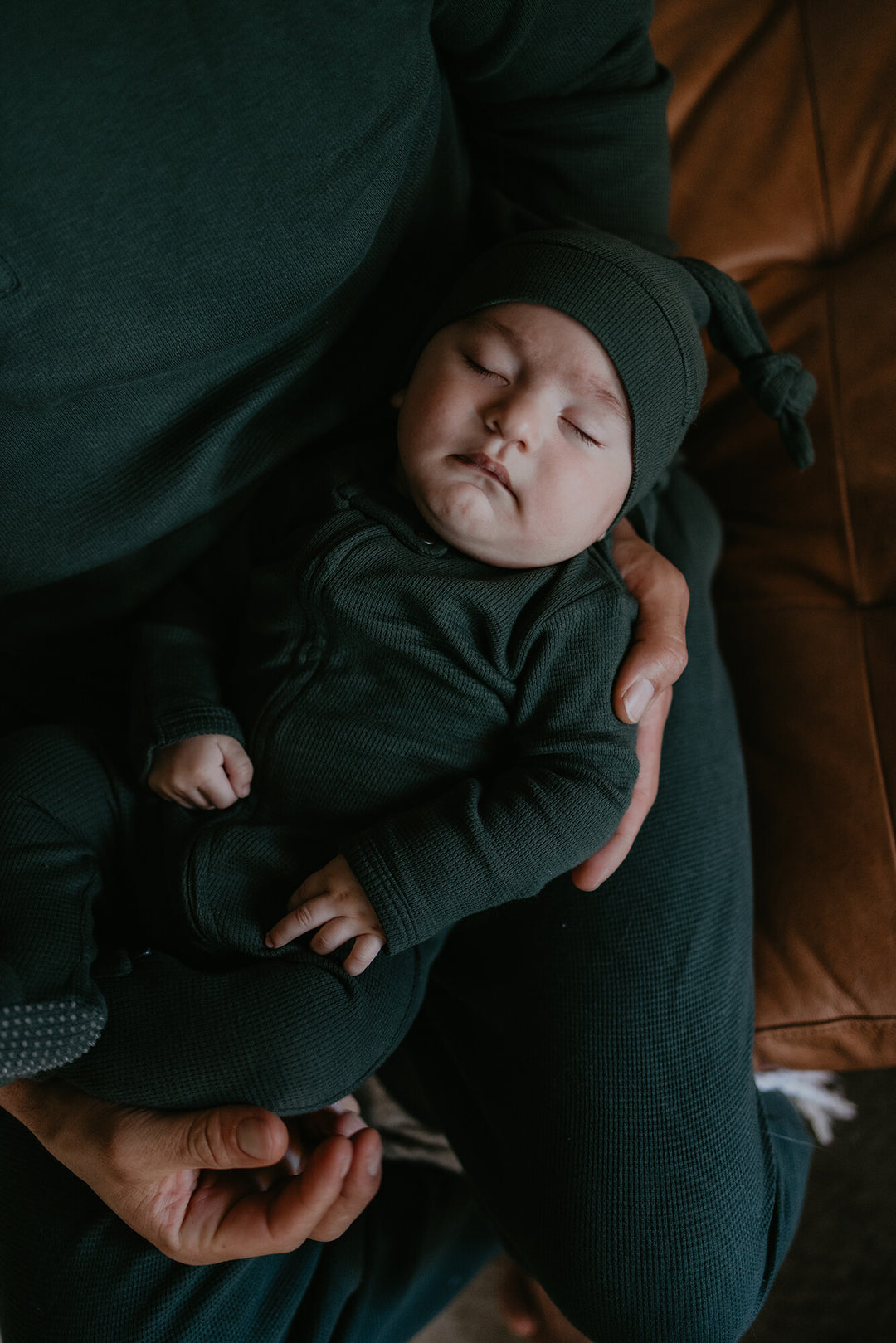 Child wearing Organic Thermal Knotted Cap in Evergreen.