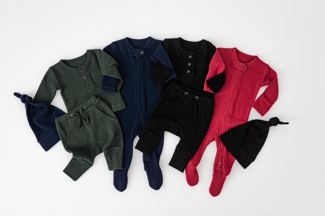 Child wearing Organic Thermal 2-Way Zipper Footie in Midnight.