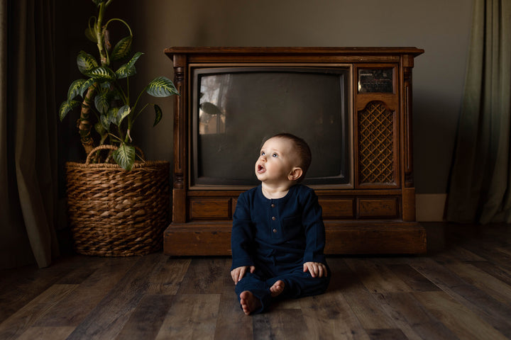 Child wearing Organic Thermal Henley & Jogger Set in Midnight.