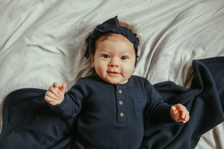 Child wearing Organic Thermal Henley & Jogger Set in Midnight.