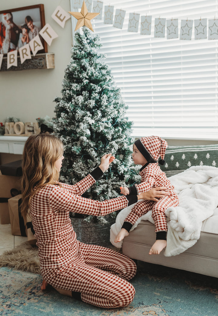 Child wearing Women's Organic Holiday 2-Pc Lounge Set with Cap in Crimson Plaid.