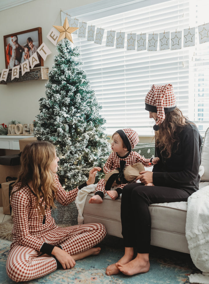 Child wearing Women's Organic Holiday 2-Pc Lounge Set with Cap in Crimson Plaid.