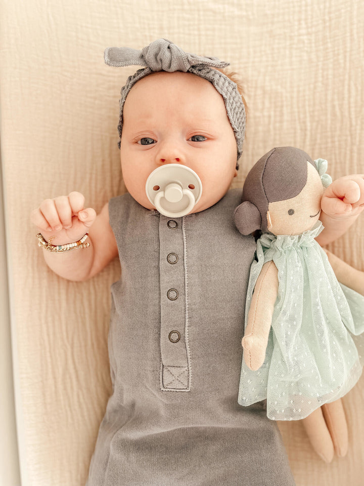 Child wearing French Terry 2-Sided Romper in Mist.