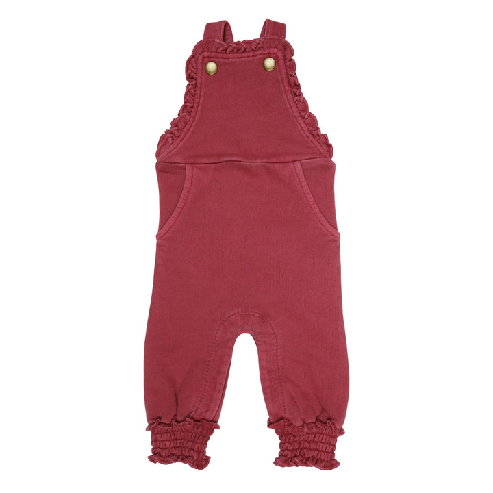 French Terry Ruffle Overall in Appleberry, a dark, dusky pink color.