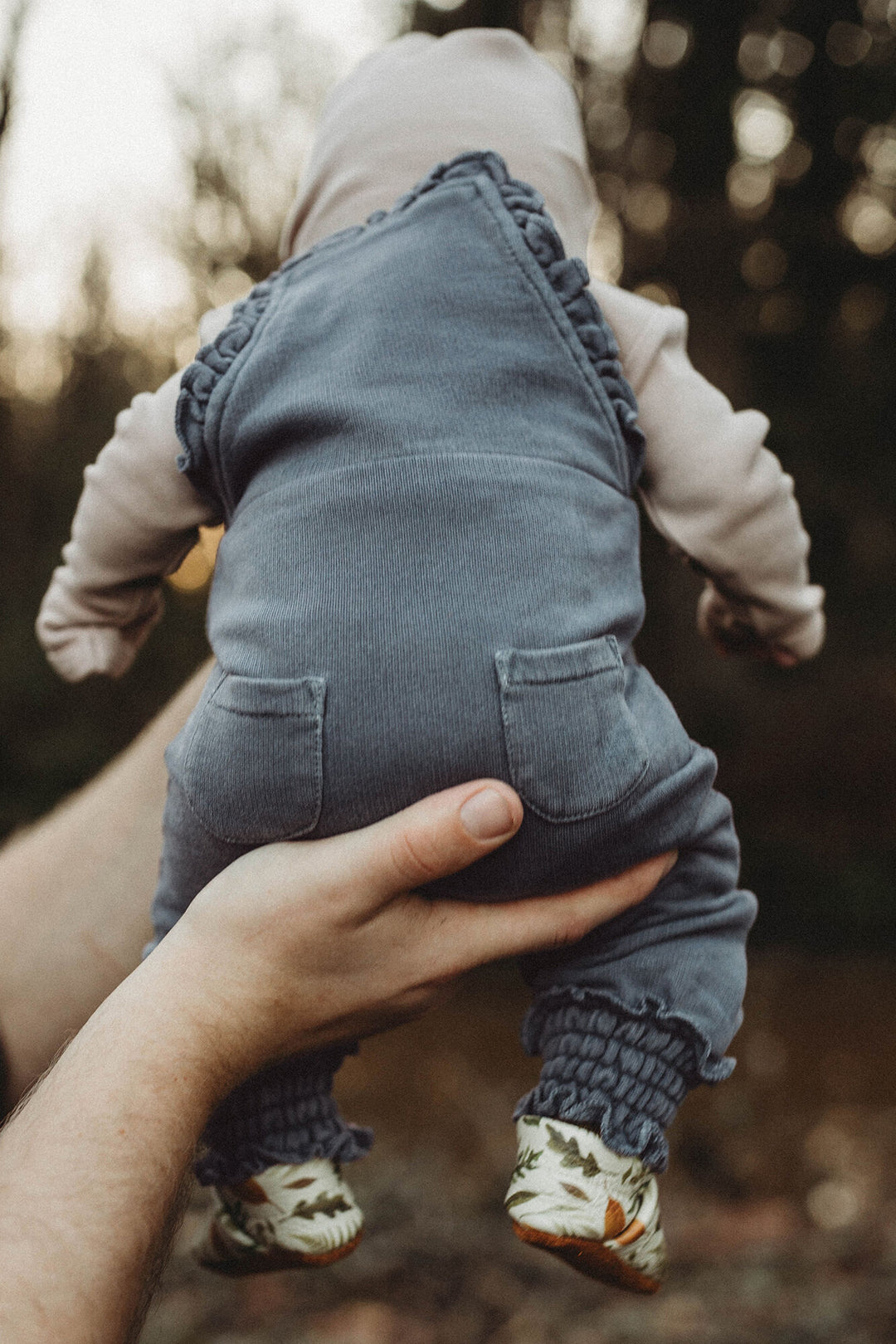 Child wearing French Terry Ruffle Overall in Moonstone.