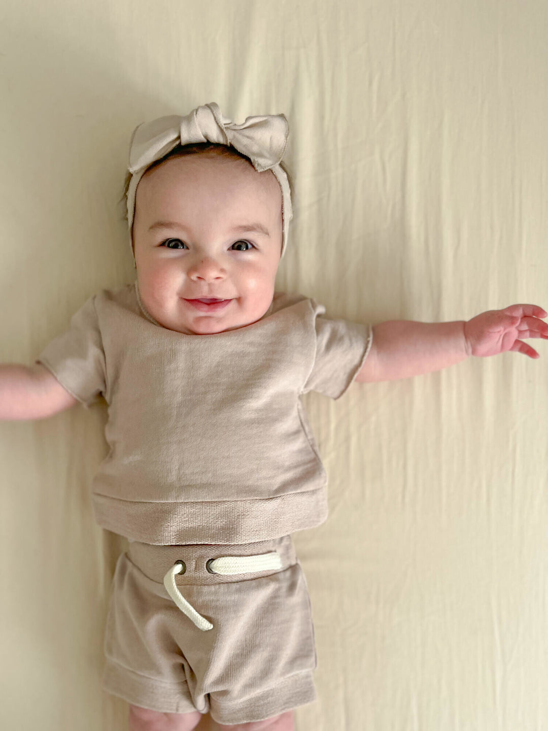 Child wearing French Terry Tee & Shorties Set in Oatmeal.