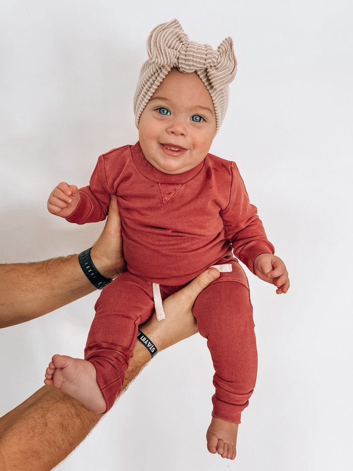 Child wearing French Terry Sweatshirt & Jogger Set in Appleberry.