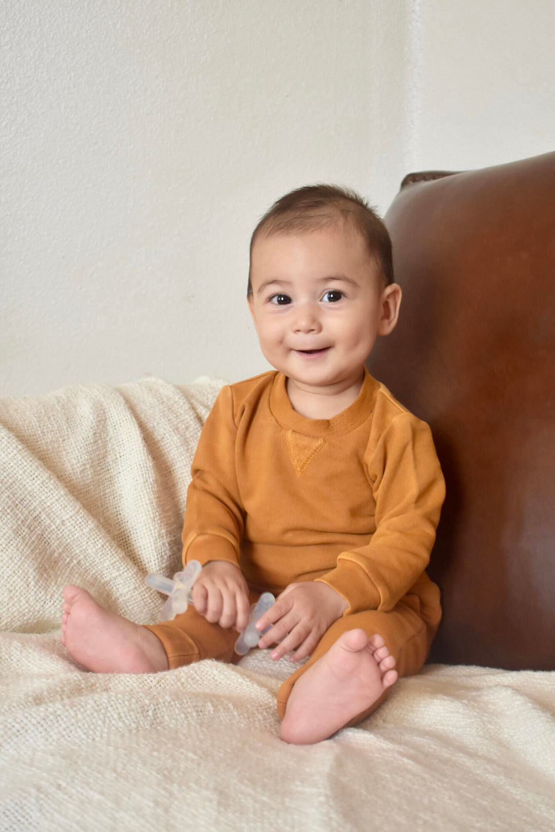 Child wearing French Terry Sweatshirt & Jogger Set in Butterscotch.