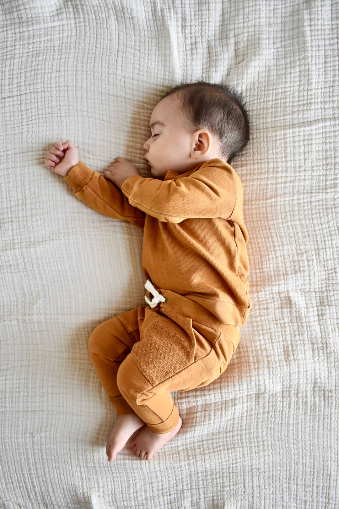 Child wearing French Terry Sweatshirt & Jogger Set in Butterscotch.