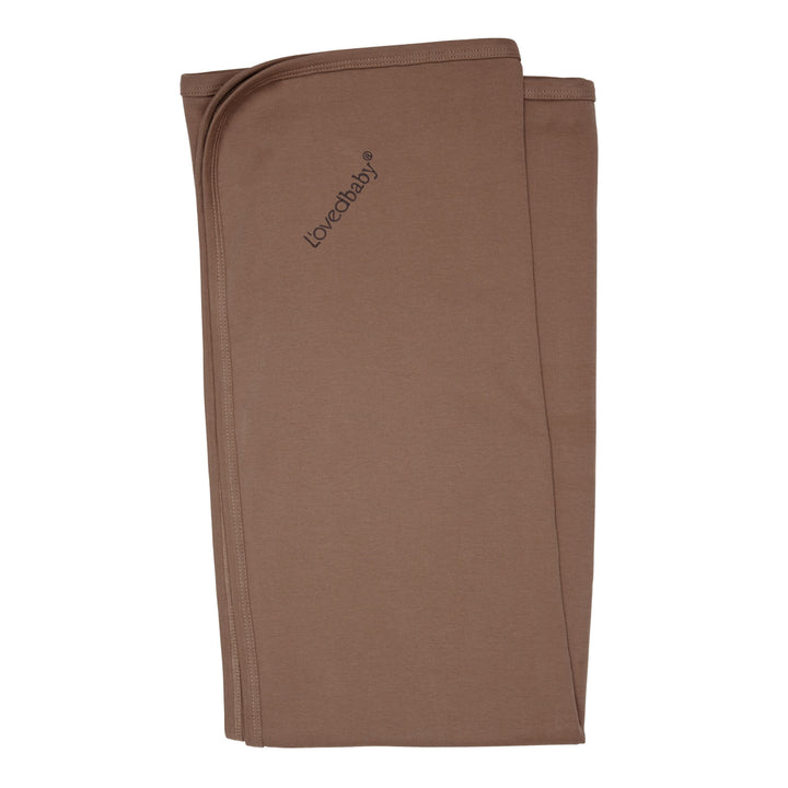 Organic Swaddling Blanket in Latte, a medium brown color.