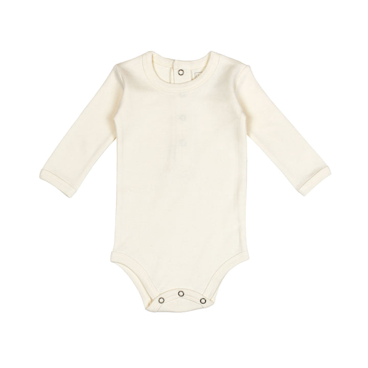 Organic Long-Sleeve Bodysuit in Buttercream, a light beige color.