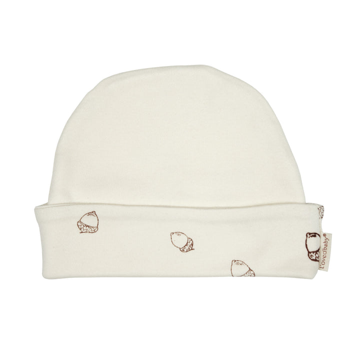 Reversible Beanie in Buttercream, a light beige color.