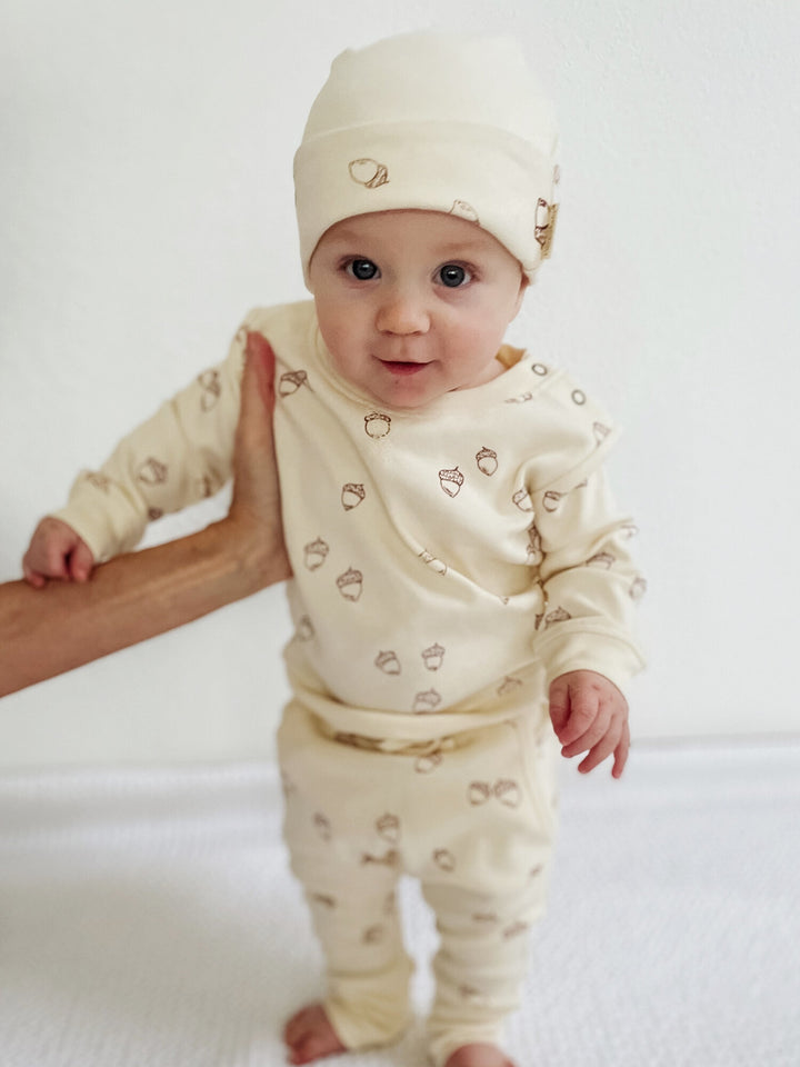 Child wearing Reversible Beanie in Buttercream.