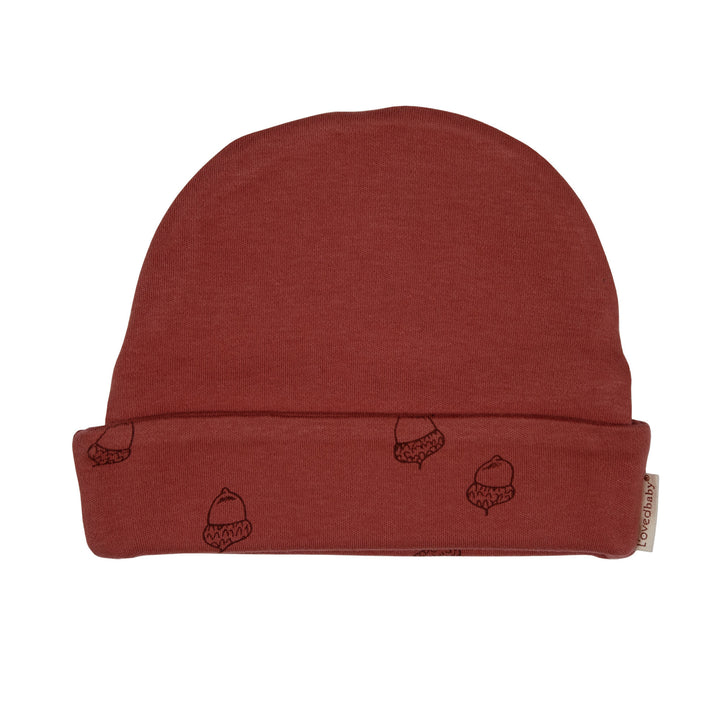 Reversible Beanie in Spice, a reddish brown color.