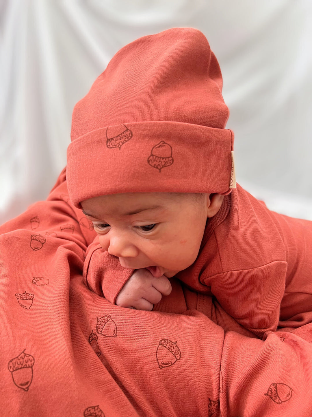 Child wearing Reversible Beanie in Spice.