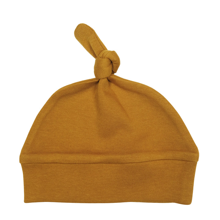 Organic Banded Top-Knot Hat in Butterscotch, a yellowish orange color.