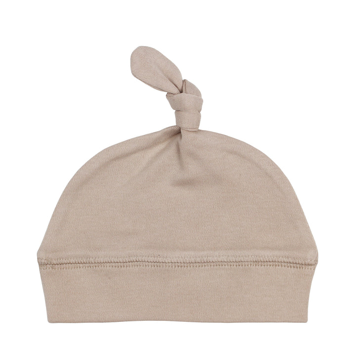 Organic Banded Top-Knot Hat in Oatmeal, a light tan color.