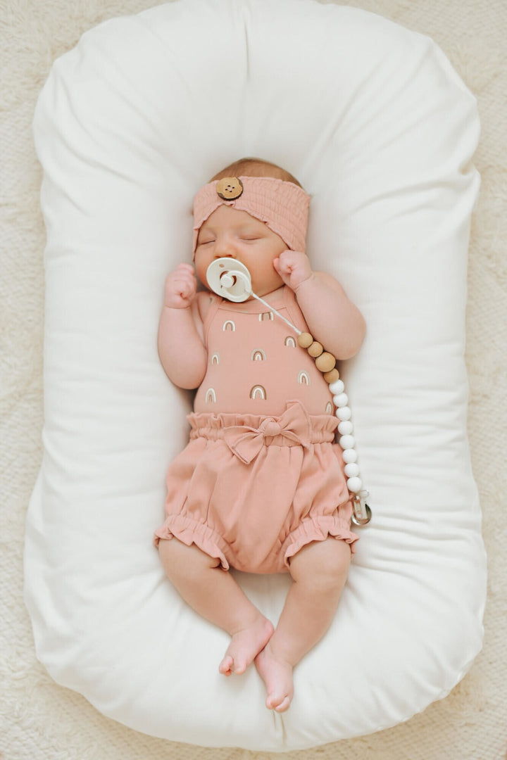 Child wearing Ruffle Bloomer in Mauve.