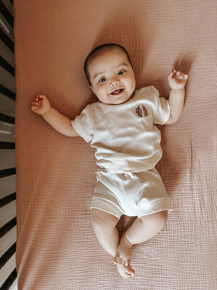 Child wearing Embroidered Tee & Shortie Set in Stone Feather.