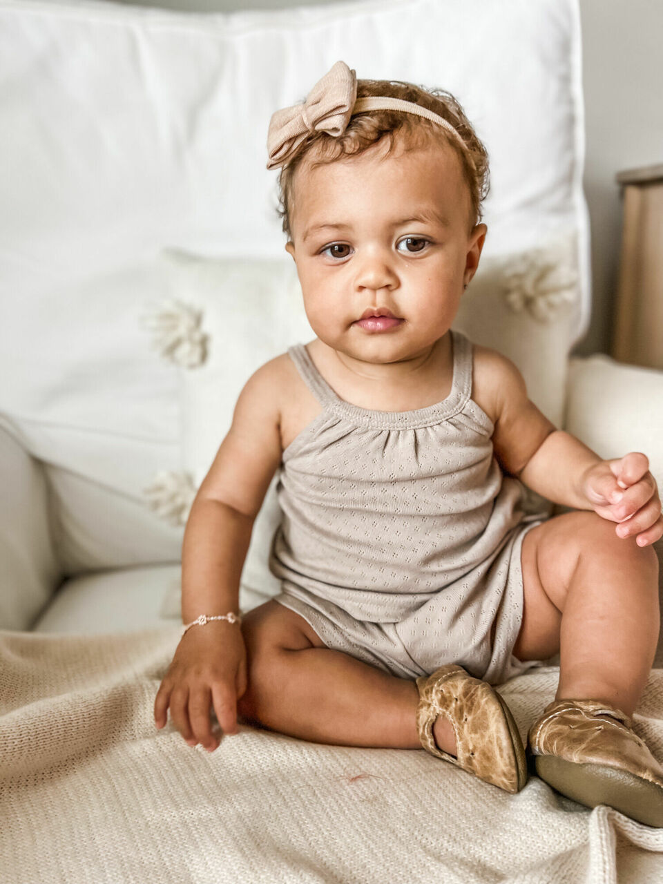 Child wearing Pointelle Tank & Tap Short Set in Sand Castle.