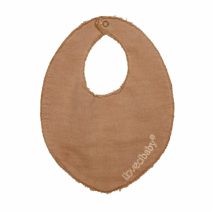 French Terry Reversible Bib in Adobe, a tan clay color.